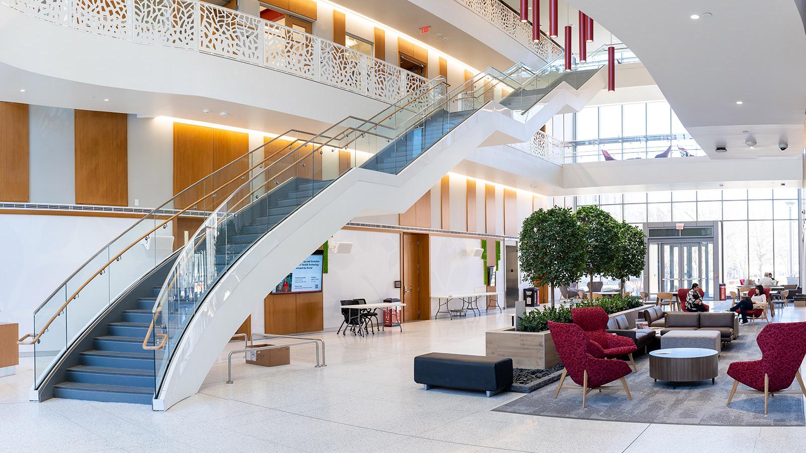 staircase and scarlet furniture inside the main floor of heminger hall
