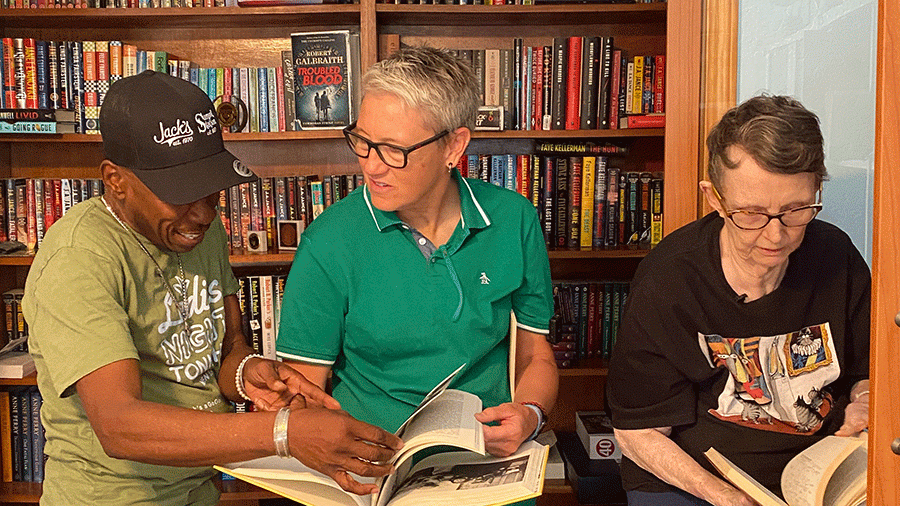 In the personal library of Rhonda Rivera, far right, at her home in Albuquerque, New Mexico